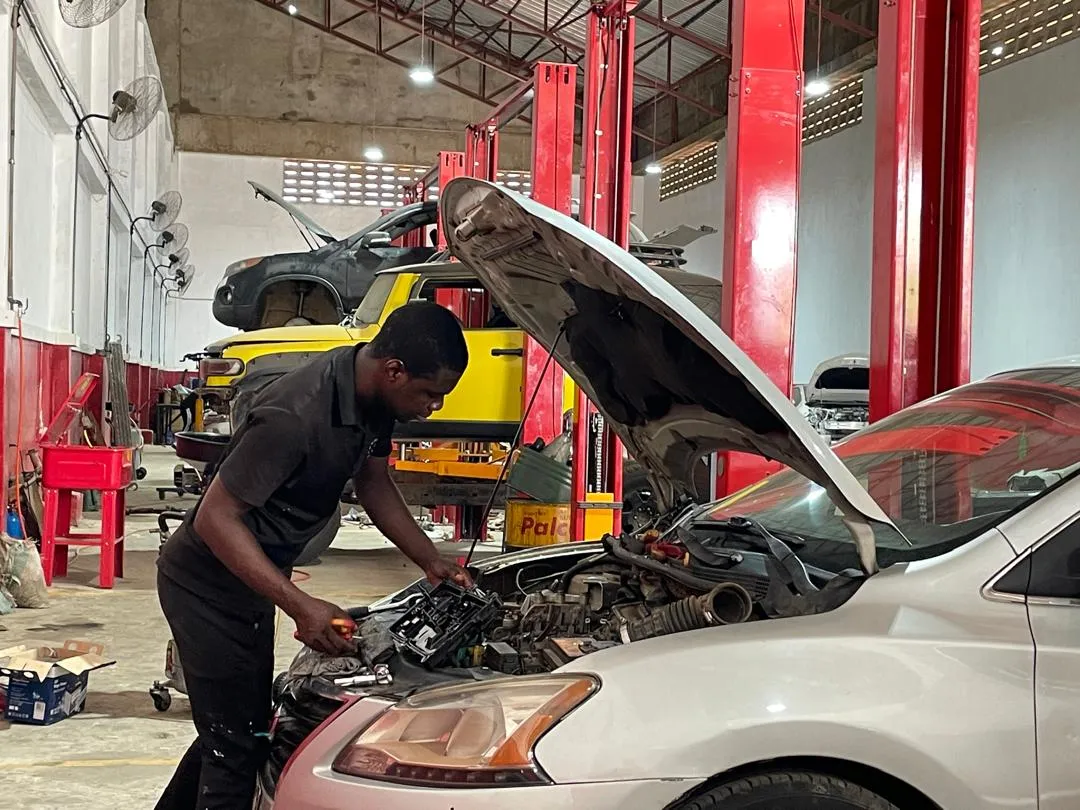 Sneda Motors workshop floor with vehicles in for service